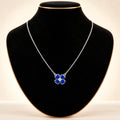 Midnight Blue Quatrefoil Clover Pendant - Hand Wear View - SURIYAS