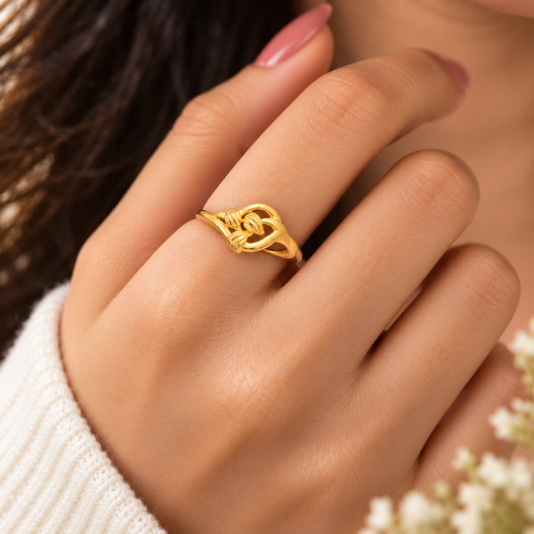 Sculpted Golden Ribbon Knot Ring - Hand Wear View - SURIYAS